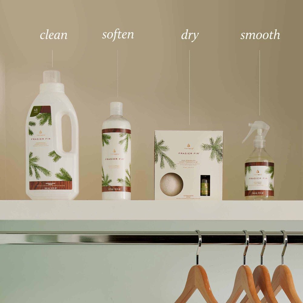 Thymes Frasier Fir Laundry Care Products Labeled Clean, Soften, Dry, Smooth image number 5